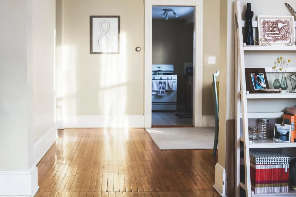 Finished living space with wood floors and light walls
